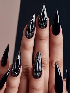 Stay ahead of the trends with sophisticated Gothic nail art designed for the modern goth. Featuring deep, rich colors and intricate patterns, these nails are perfect for those who love to make a statement. Whether you prefer the simplicity of a matte black manicure or the boldness of detailed nail art, our Gothic nails offer a variety of styles to suit your personality. Add some dark glamour to your look with these stunning designs. Matte Black Manicure, Dark Goth Nails, Detailed Nail Art, Dark Glamour, Modern Goth, Black Manicure, Goth Nails