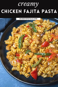 pasta with chicken and peppers on a black plate, text reads easy ever creamy chicken fajita pasta