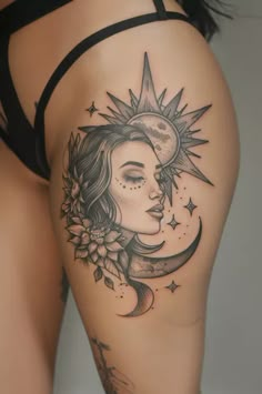 a woman's thigh with a sun and moon tattoo on her side, as well as flowers