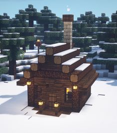 a house made out of logs in the snow