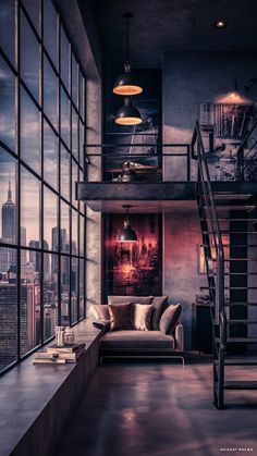 a living room filled with furniture next to tall windows and a staircase leading up to the second floor