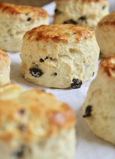 biscuits with raisins are sitting on a table