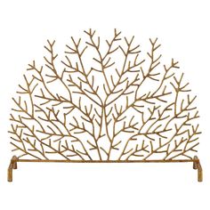 a metal shelf with a tree design on the top and bottom, against a white background