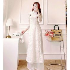 👉 7 DAY REFUND SUPPORT FOR CUSTOMERS IN VIETNAM * Still a Vietnamese girl walking down the street, how beautiful are her innovative ao dai. Selected from the best materials, the 4-piece modern ao dai will bring her the perfect experience. * With a delicate ao dai design in the flower-embroidered sleeves, a little bit of momentum with a stylized side part, this innovative ao dai can turn any girl into a beautiful lady. , young, lovely. * Ao dai in different colors such as pink and beige helps he Elegant White Ao Dai For Formal Occasions, Lace Ao Dai For Wedding, Elegant Long Dresses For Ceremony, Spring Wedding Long Gown, Lace Fitted Ao Dai For Wedding, Spring White Gown For Banquet, Spring Wedding Long Maxi Dress, White Spring Banquet Gown, Spring Wedding Long Dresses