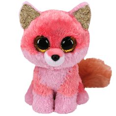 a pink and gold stuffed animal with big eyes