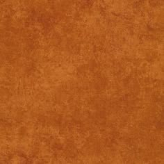 an orange colored textured wallpaper background