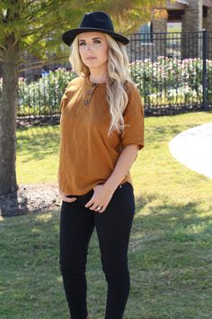 henley short sleeve knit top functional button tabs 100% cotton color: burnt orange our model Alex is 5'4 and wearing size Small. Casual Button-up Henley For Everyday, Brown Tops For Casual Gatherings In Fall, Everyday Henley Neckline Top With Button Closure, Casual Brown Henley Neckline Top, Everyday Tops With Buttons, Casual Everyday Henley With Buttons, Casual Everyday Henley, Solid Henley Neckline Tops For Everyday, Orange Short Sleeve Top With Buttons