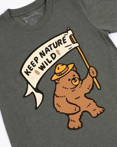 Hold it high & wave it proud! This tee is designed for your little bear to celebrate their love for nature. It's unbelievably comfy + soft, and holds up to the wear & tear of little explorers! Regular fit Lightweight Cotton/poly blend We’re not your average outdoor brand... together we pick up one pound of trash from the wild for every product sold! Find out more here! Bear Shirt Kids, Recycle Water Bottles, Made For Kids, Pet Gear, Best Water Bottle, One Pound, Little Bear, Dog Stickers, Happy Camper