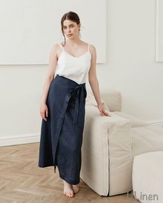 Check out our Linen Wrap Skirt! It's all about easy style and comfort. Made from top-notch linen, this skirt is perfect for all-day wear. Plus, its wrap design lets you adjust the fit just how you like it. MATERIAL: - High quality natural linen 100%  Listing INCLUDES: - 1 pc. Wrap Skirt  FEATURES: - Wide bottom - Waist tie - 100% Linen - Stonewashed - Soft - OEKO TEX Certified Model is wearing size M Color: Midnight Blue Model Measurements: Height: 5.7 ft. (176 cm) Bust: 35.4' (90 cm) Waist: 24. Spring Wrap Bottoms With Relaxed Fit, Casual Wrap Skirt For Summer, Bohemian Linen Relaxed Skirt Bottoms, Bohemian Linen Bottoms With Relaxed Skirt, Bohemian Linen Bottoms With Relaxed Skirt Fit, Summer Wrap Cotton Bottoms, Summer Cotton Wrap Bottoms, Spring Cotton Wrap Bottoms, Spring Wrap Skirt