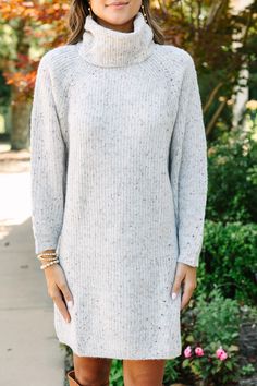 We are really feeling this sweater dress! That confetti knit fabric is so cozy and warm! Not to mention that turtleneck is sure to keep nice and toasty! This sweater dress is going to look fabulous with tall boots for fall or winter! Cozy turtleneck Long dolman sleeves Confetti knit fabric Generous stretch Sydney is wearing the small. Cozy White Sweater Dress For Fall, White Turtleneck Sweater Dress, Cozy Turtleneck Knit Sweater Dress, Cozy Fitted Turtleneck Sweater Dress, Tirtle Neck Sweater Dress, White Turtleneck Sweater, White Sweater Dress, Bold Outfits, Fall Sweater Dress