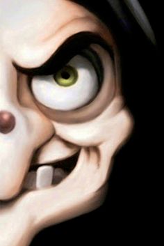 an evil looking face with green eyes and black hair is seen in this animated image