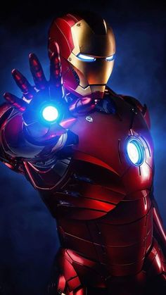 an iron man with glowing eyes and hands