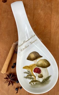 a spoon with some mushrooms on it