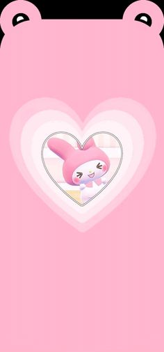 a pink heart with a cute bunny on it