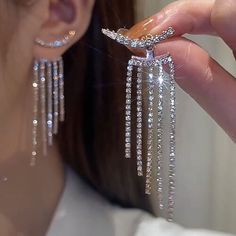 Gender:Women's; Quantity:1 Pair; Theme:Precious; Shape:Geometric; Style:Stylish,Luxury; Width of Earrings:-; Jewelry Type:Drop Earrings,Fine Jewelry; Occasion:Wedding,Party; Material:Rhinestone,Chrome; Length of Earrings:-; Design:Tassel Fringe; Features:Cool,Lovely; Front page:WE; Listing Date:07/27/2023 Long Tassel Earrings, Luxury Earrings, Stil Elegant, Tassel Drop Earrings, Tassel Jewelry, Wedding Party Jewelry, Birthday Jewelry Gift, Girls Jewelry, Rhinestone Earrings