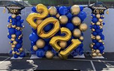 some balloons that are in the shape of letters and numbers on top of each other