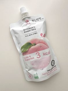 a package of pinkish konjac jelly on a white surface