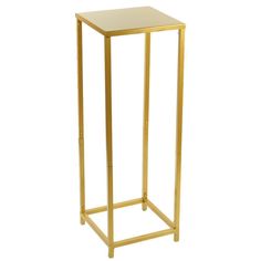 a gold metal side table with a white top and bottom shelf on one end, against a white background