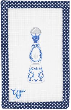 a blue and white cross stitch pattern with dots