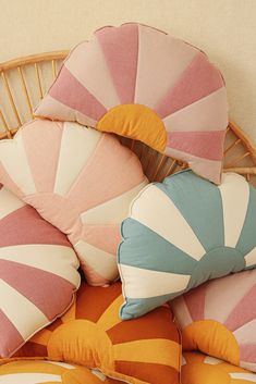 colorful pillows stacked on top of each other