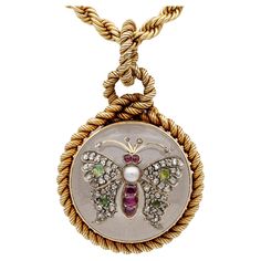 Victorian Marvel A very rare Victorian period locket pendant plus chain – French origin 1860/1880 ca The large locket is of circular shape carved from polished Rock Crystal – nestled into gold hinged lock work with an interlaced rope knotted frame, all of solid 18 Kt gold The high domed Rock Crystal top has a butterfly applied enriched with fine antique gems: Ruby, Natural Pearl, Chrysolite effect against the Rock Crystal gemstone – all in fine condition and perfect order – comes with an antique Heirloom Medallion Intaglio Jewelry, Crystal Locket, Large Locket, Crystal Top, Victorian Period, Gold Locket, Crystal Diamond, Natural Pearl, Yellow Gold Chain