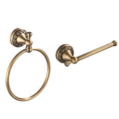 an antique brass towel ring and toilet paper holder with decorative knobs on each side