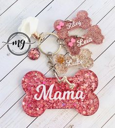 personalized glitter dog bone keychain with custom name and heart shaped paw prints