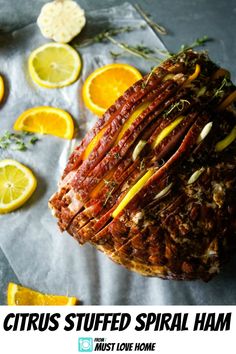 citrus stuffed spiral ham with herbs and lemons