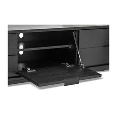 a black entertainment center with drawers and lights