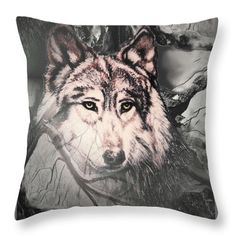 a wolf throw pillow with an artistic background