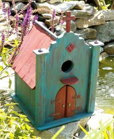 a birdhouse made out of an old door