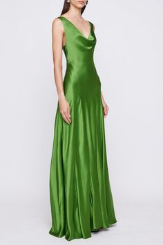 a woman in a green gown