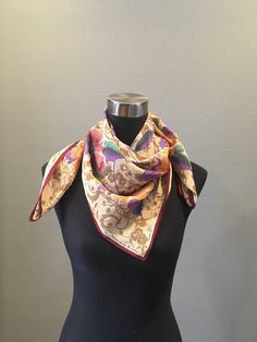 "Fabulous Oscar de la Renta scarf in gold, magenta, purple and green colorway floral pattern on a beige background with a magenta border and gold embossing. The scarf measures 31\" x 30\". Signed with the Oscar de la Renta signature. 100% silk. In very good condition. The tag is loose. FREE SHIPPING EVERYWHERE Prices are listed for Canada and USA only but if you wish to have them shipped elsewhere, please message me the shipping address and I will gladly send you a quote. We proudly reuse shippi Classic Gold Silk Scarf, Classic Multicolor Silk Scarf, Classic Multicolor Silk Scarf For Formal Occasions, Vintage Cream Silk Scarf, Vintage Multicolor Silk Scarf For Formal Occasions, Multicolor Vintage Silk Scarf For Formal Occasions, Gold Bohemian Silk Scarves, Gold Silk Bohemian Scarf, Gold Silk Bohemian Scarves