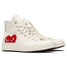 The iconic collaboration between Converse and Comme Des Garçons PLAY continues with the All Star Chuck ‘70 Hi. The traditional Converse silhouette features the signature bug-eyed red heart motif throughout the exterior. The silhouette is complete with a full-lace closure, and a rubber toebox and outsole for extended durability. CHUCK TAYLORS RUN ABOUT 1/2 SIZE LARGE, WE RECOMMEND SIZING DOWN. THIS PRODUCT DOES NOT QUALIFY FOR ANY DISCOUNTS OR SPECIAL PROMOTIONS. Canvas upper Printed CDG heart lo Heart Converse, Comme Des Garcons Shoes, Converse X Comme Des Garcons, Converse Play, Doodles Ideas, Obx Dr, Garcons Converse, Cute Converse, Comme Des Garcons Converse