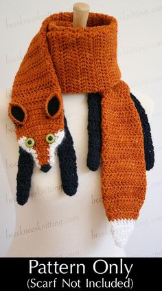 an orange scarf with a black and white fox on it