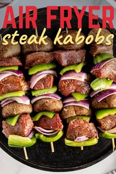 an image of steak kabobs on skewers with the title air fryer steak kabobs