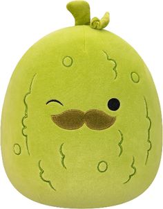 a green stuffed animal with a mustache on it's head and eyes, sitting in front of a white background