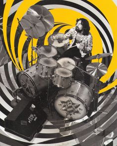 a man sitting on top of a drum set in front of a yellow and black background