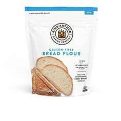 a bag of bread that is sitting on a white surface with a blue stripe around it