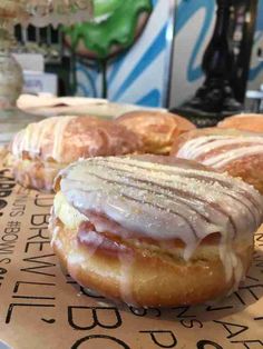 three pastries sitting on top of a table next to each other