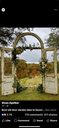 an old door is open to reveal the garden