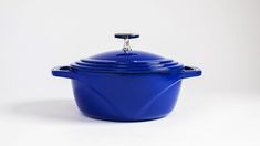 a blue casserole dish on a white background