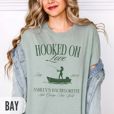 Make your next girls' trip, bachelorette party, or birthday celebration extra special with this custom fishing shirt. It's the perfect personalized gift or party favor! Personalization:  All text on the design can be customized. Input your requests in the personalization box. A proof will be sent within 24 hours of ordering for approval prior to printing.  Shirt Details: Unisex crewneck shirt with a relaxed fit. Made of a soft-washed, garment-dyed medium fabric of 100% cotton. Comfort and durabi Fishing Themed Bachelorette Party, Fishing Bachelorette Party, Wisconsin Dells Bachelorette, River Bachelorette Party, Lake Bachelorette Party, Lake Bachelorette, Friends Bachelorette, Outdoorsy Girl, Fishing Wedding