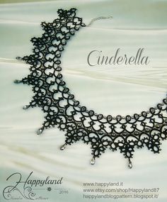 the necklace is made up of black beads and silver filigrees on it