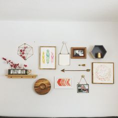 the wall is covered with pictures and other items