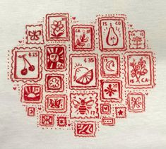 a white t - shirt with red designs on it