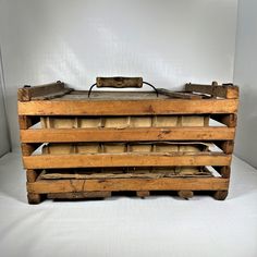 three wooden crates stacked on top of each other