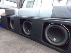 the back end of a car with speakers in it