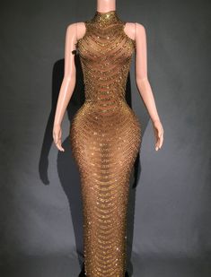 Stunning Gold Sleeveless Crystal Embellished Maxi Gown. If you're looking for that sparkly, bling statement piece, you have found it! Made to order - Please allow 4-6 weeks for production  * Sizing - All items are made according to measurement ranges, they are NOT typical letter or numeric sizing. It is imperative to compare your exact measurements with the size chart provided either in the listing photos or item descriptions and to also add your measurements under Personalization. If you have a Bejeweled Dress, Crystal Dresses, Feather Dresses, Sparkly Fashion, Classic Dresses, Feather Jacket, Crystal Dress, Feather Tops, Thousand Oaks