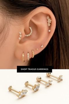 three pairs of ear piercings with crystal stones on each side and the same one in gold